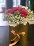 Celebrate with a Box of Flowers and Cake or truffle.